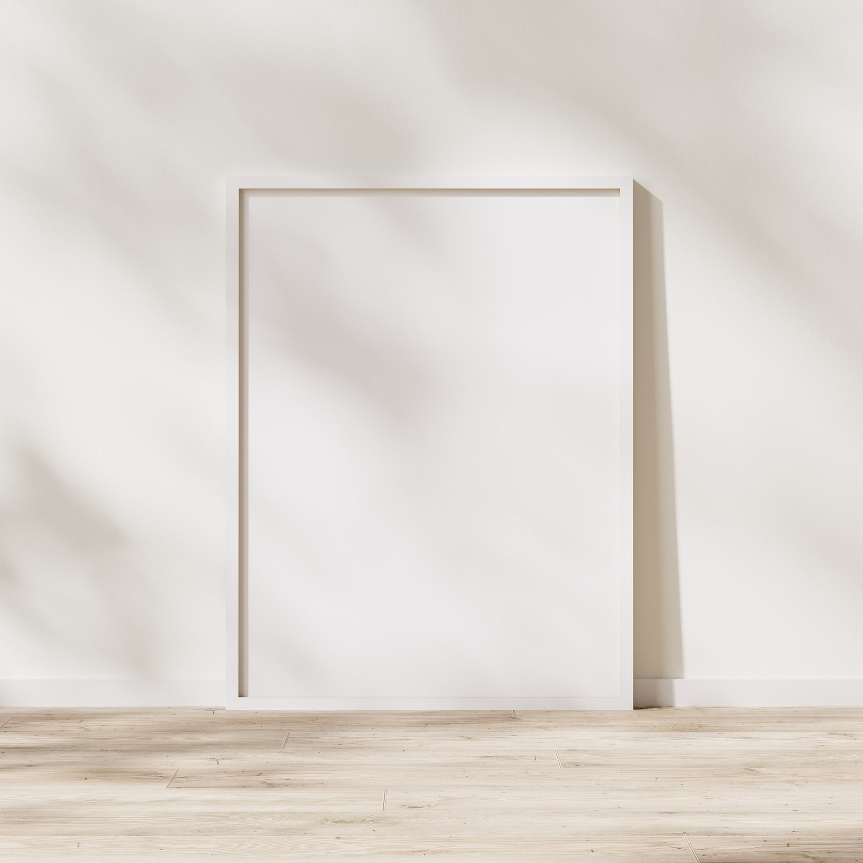 Blank White Frame on Wooden Floor Against White Wall